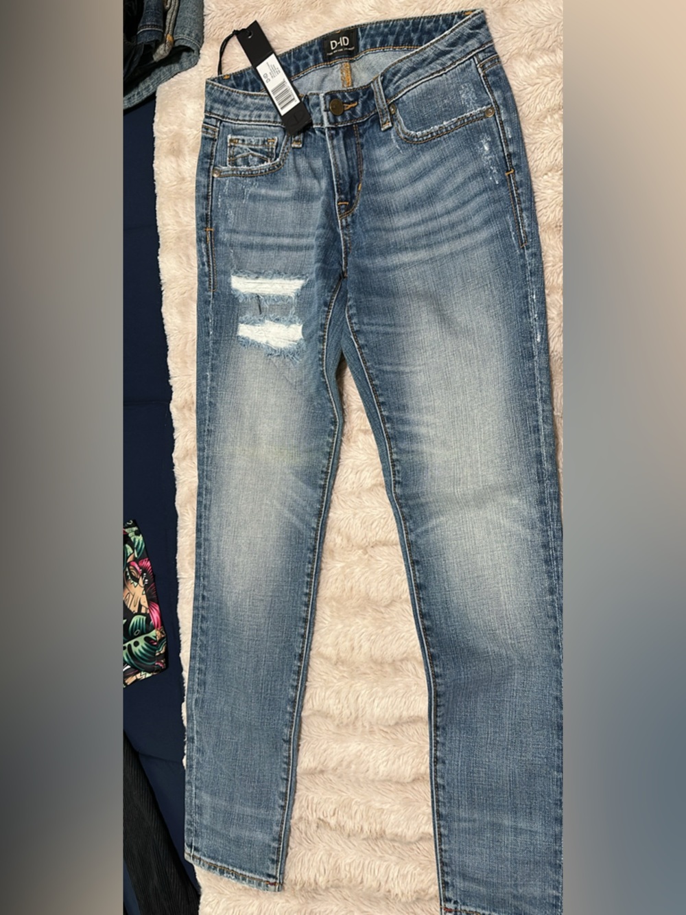 Light Blue Skinny Jeans with Distressed Knee